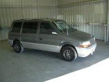 Dark Quartz Gray Metallic Plymouth Voyager in 1995