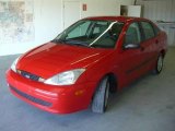 2002 Infra Red Ford Focus LX Sedan #18393495