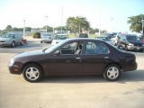 1997 Black Cherry Pearl Nissan Altima GXE #18401129