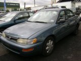 Orchid Blue Pearl Toyota Corolla in 1995