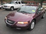 Deep Cranberry Red Pearl Chrysler Cirrus in 2000