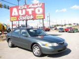 Lichen Green Pearl Mazda 626 in 1998