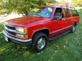 Victory Red Chevrolet Suburban in 1999