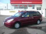 2009 Salsa Red Pearl Toyota Sienna LE #20230149