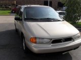 Cypress Gold Frost Metallic Ford Windstar in 1998