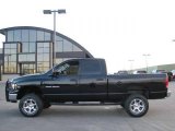 2005 Black Dodge Ram 1500 SLT Quad Cab 4x4 #21878324