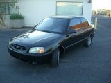 2001 Ebony Black Hyundai Accent L Coupe #22001970