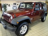 2010 Red Rock Crystal Pearl Jeep Wrangler Unlimited Sport 4x4 #22062429