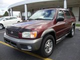 Burnt Cherry Red Pearl Nissan Pathfinder in 2001