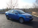 2010 Blue Flame Metallic Ford Focus SES Sedan #22764452