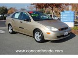 2000 Fort Knox Gold Metallic Ford Focus SE Sedan #22827808