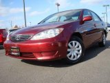 2005 Salsa Red Pearl Toyota Camry LE #22980054