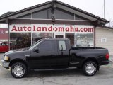1997 Black Ford F150 XLT Extended Cab 4x4 #23947225