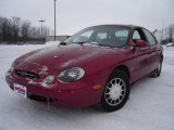 1999 Toreador Red Metallic Ford Taurus SE #24387548