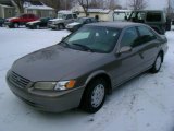 1999 Sable Pearl Toyota Camry LE #24493005