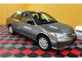 2004 Magnesium Metallic Honda Civic LX Sedan #24493380