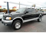 2000 Black Ford F150 Lariat Extended Cab 4x4 #24874955