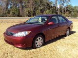2005 Salsa Red Pearl Toyota Camry LE #24999564