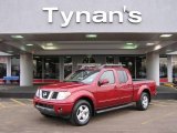 2008 Red Brawn Nissan Frontier LE Crew Cab 4x4 #25047378