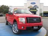 2009 Bright Red Ford F150 STX SuperCab 4x4 #25062495