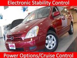 2009 Claret Red Kia Sedona LX #25693899