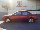 1996 Medium Red Saturn S Series SL2 Sedan #25792890