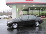 2010 Black Toyota Camry LE #26258526