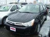 2010 Ebony Black Ford Focus SE Sedan #26258203