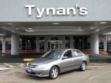 2004 Magnesium Metallic Honda Civic EX Sedan #26355520