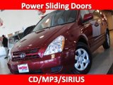 2009 Claret Red Kia Sedona LX #26595240