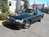 Dark Green Pearl Metallic Infiniti Q in 1997