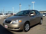 2006 Desert Sand Mica Toyota Corolla LE #26672781