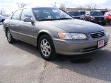 Antique Sage Pearl Toyota Camry in 2000