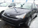 2010 Ebony Black Ford Focus SES Sedan #26996454