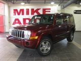 2009 Red Rock Crystal Pearl Jeep Commander Sport #27071158