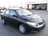 2010 Black Sand Pearl Toyota Corolla LE #27169230