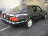 Black Opal Pearl Metallic Mercedes-Benz E in 1997