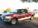 1997 Dark Toreador Red Metallic Ford F150 XLT Extended Cab #27414083