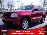 2010 Inferno Red Crystal Pearl Jeep Grand Cherokee Laredo #27413820