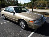 Harvest Gold Metallic Ford Crown Victoria in 1999