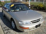 1999 Sunlit Sand Metallic Nissan Maxima GLE #27544864