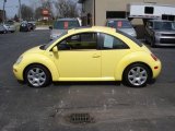 Yellow Volkswagen New Beetle in 2001