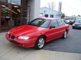 Bright Red Pontiac Grand Am in 1997