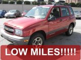 Sunset Red Metallic Chevrolet Tracker in 2001