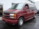 2002 Dark Carmine Red Metallic Chevrolet Express 1500 Passenger Van #28312257