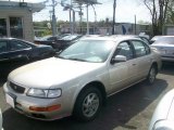 Pebble Beige Metallic Nissan Maxima in 1996