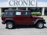 2010 Red Rock Crystal Pearl Jeep Wrangler Unlimited Sport 4x4 #28461520