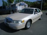 Ivory Pearl Metallic Lincoln Town Car in 1998