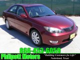 2005 Salsa Red Pearl Toyota Camry SE #29097479