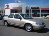 Light Prairie Tan Metallic Ford Contour in 1998
